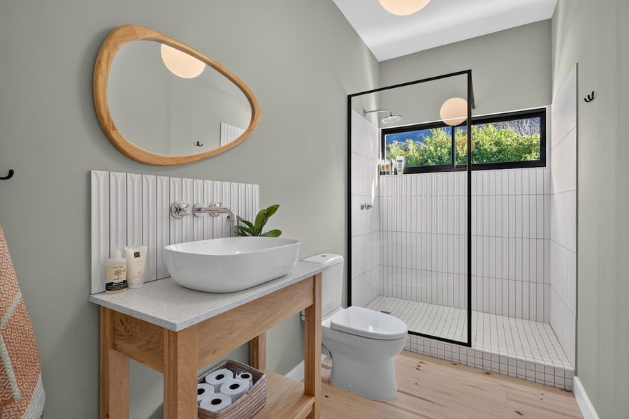 Sage green ensuite bathroom